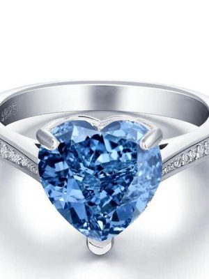 Heart Design Blue Topaz Engagement Ring in Rhodium Plated Sterling Silver