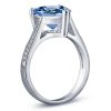 Heart Design Blue Topaz Engagement Ring in Rhodium Plated Sterling Silver