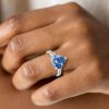Heart Design Blue Topaz Engagement Ring in Rhodium Plated Sterling Silver
