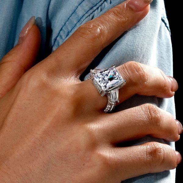 Three Stone Radiant Created White Sapphire Engagement Ring in Rhodium-Plated Sterling Silver (10.55 CTW)