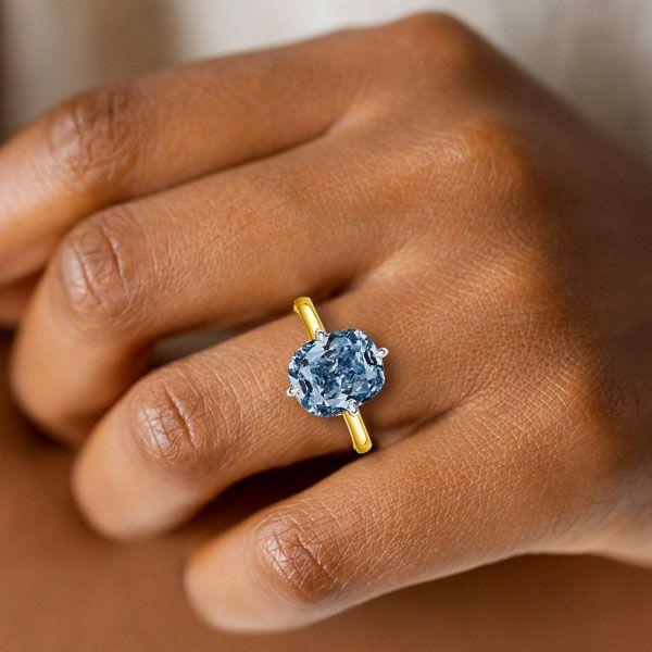 Blue Topaz Cushion Cut Solitaire Engagement Ring in Sterling Silver