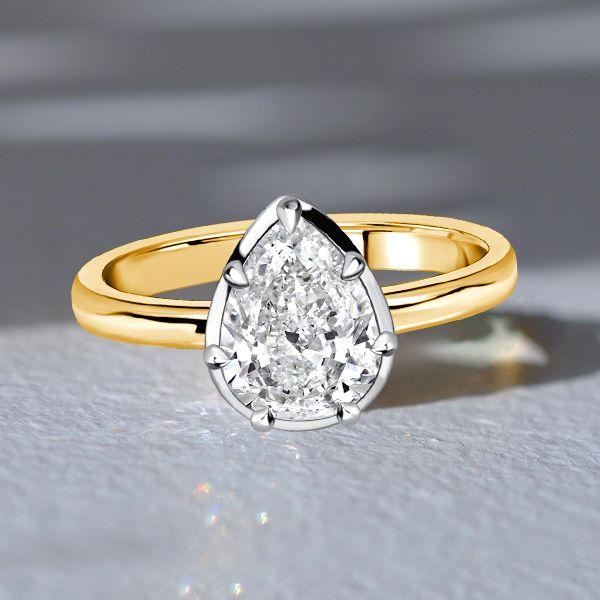 Pear Cut White Sapphire Teardrop Engagement Ring in Sterling Silver