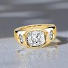 3 CT. Cushion Cut Three Stone Engagement Ring in 18K Gold Plated Sterling Silver