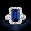 Emerald Cut Blue Sapphire Halo Engagement Ring in Sterling Silver with Rhodium Finish