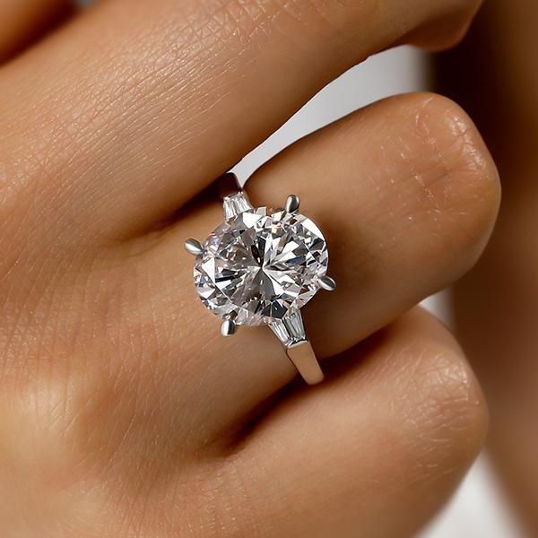 Oval Created White Sapphire Three Stone Engagement Ring in Sterling Silver