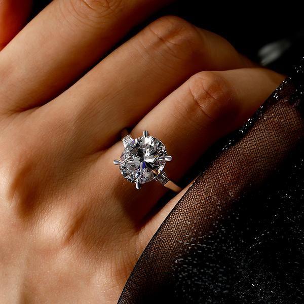 Oval Created White Sapphire Three Stone Engagement Ring in Sterling Silver