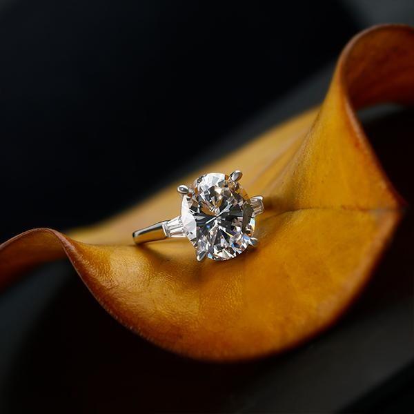 Oval Created White Sapphire Three Stone Engagement Ring in Sterling Silver