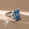 Three Stone Blue Topaz Emerald Cut Engagement Ring in Sterling Silver