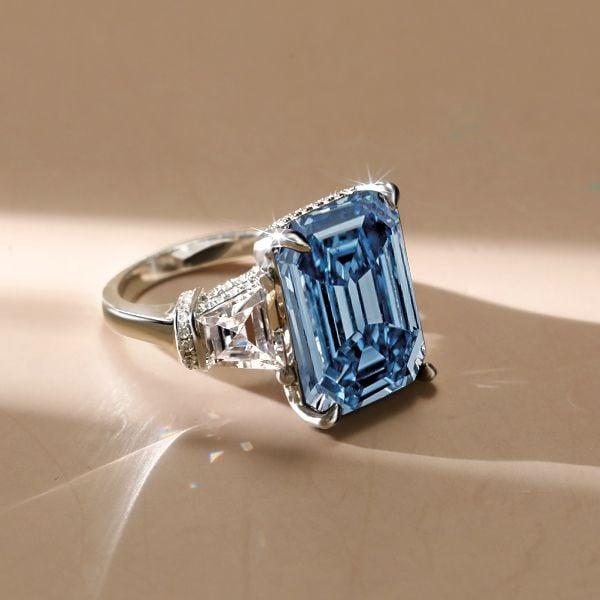 Three Stone Blue Topaz Emerald Cut Engagement Ring in Sterling Silver