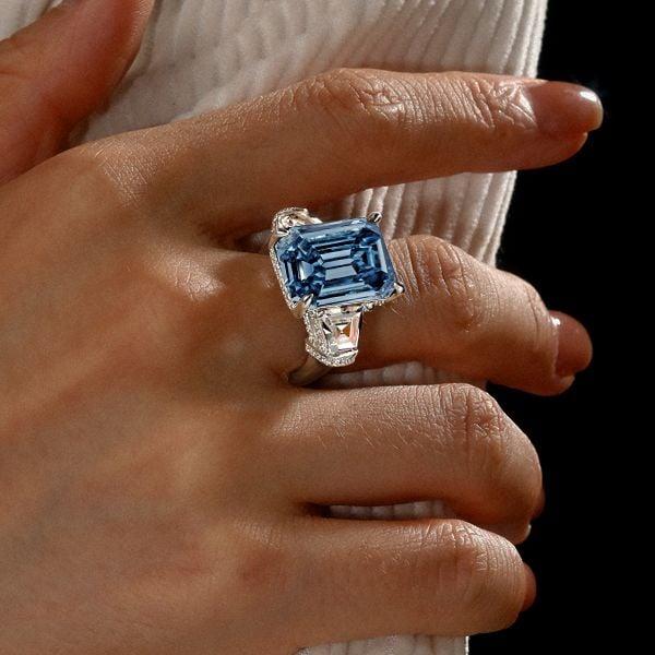 Three Stone Blue Topaz Emerald Cut Engagement Ring in Sterling Silver