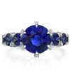 Round Cut Created Blue Sapphire Eternity Engagement Ring in Sterling Silver