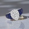 Two Tone Halo Pear Cut Blue Sapphire Engagement Ring in Sterling Silver