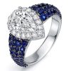Two Tone Halo Pear Cut Blue Sapphire Engagement Ring in Sterling Silver