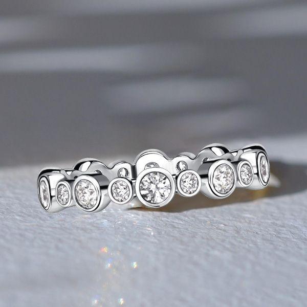 Sterling Silver Round Cut Eternity Band Ring - Bezel Set 0.78 CT. TW.