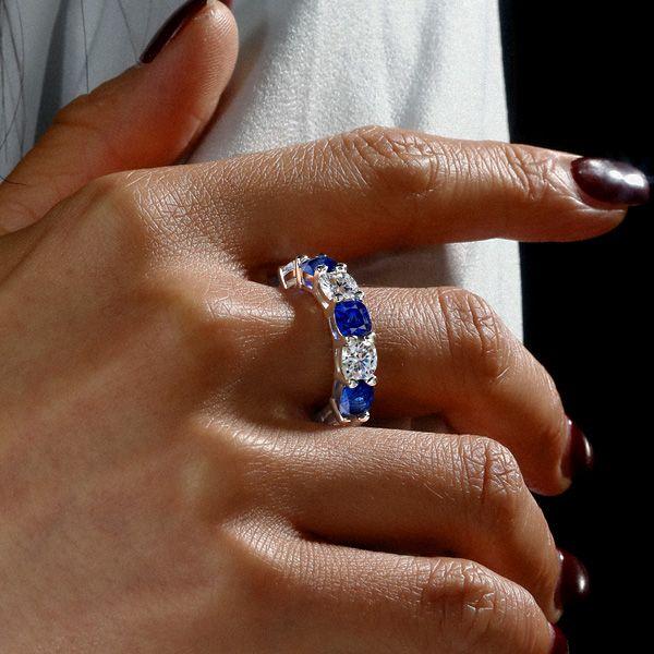 White & Blue Sapphire Cushion Cut Sterling Silver Eternity Band