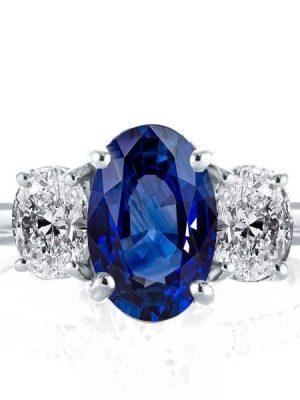 Three Stone Oval Cut Blue Sapphire Engagement Ring in Sterling Silver