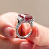 Emerald Cut Three Stone Engagement Ring in Rhodium Plated Sterling Silver