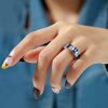Eternity Emerald Cut Blue & White Simulated Diamond Wedding Band in Sterling Silver