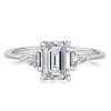 Emerald Cut Three Stone Engagement Ring in Rhodium Plated Sterling Silver