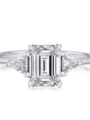 Emerald Cut Three Stone Engagement Ring in Rhodium Plated Sterling Silver