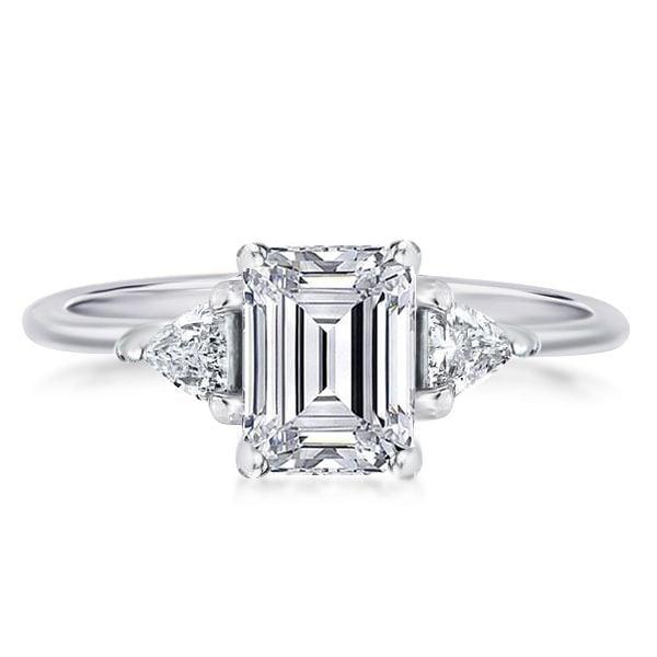 Emerald Cut Three Stone Engagement Ring in Rhodium Plated Sterling Silver