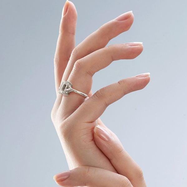 Emerald Cut Three Stone Engagement Ring in Rhodium Plated Sterling Silver