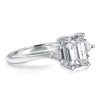 Emerald Cut Three Stone Engagement Ring in Rhodium Plated Sterling Silver