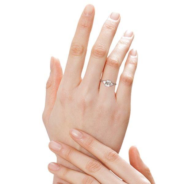 Emerald Cut Three Stone Engagement Ring in Rhodium Plated Sterling Silver