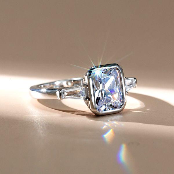 Three Stone White Sapphire Engagement Ring - Bezel Set Sterling Silver