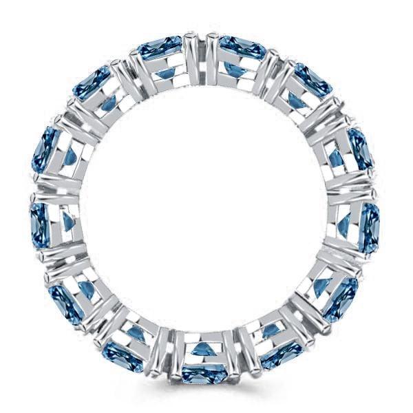 Oval Cut Blue Topaz Eternity Wedding Band in Rhodium Plated 925 Sterling Silver