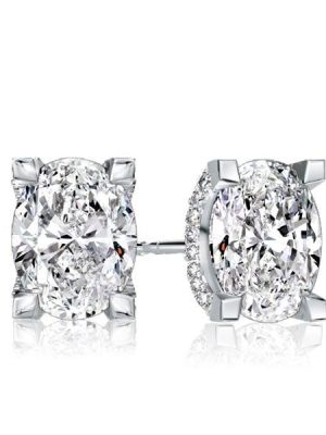 Oval Cut White Sapphire Stud Earrings in Rhodium Plated Sterling Silver