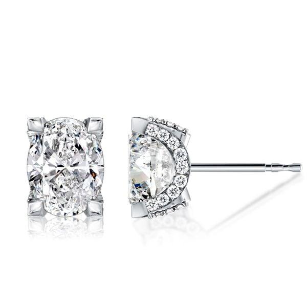 Oval Cut White Sapphire Stud Earrings in Rhodium Plated Sterling Silver