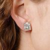 Oval Cut White Sapphire Stud Earrings in Rhodium Plated Sterling Silver