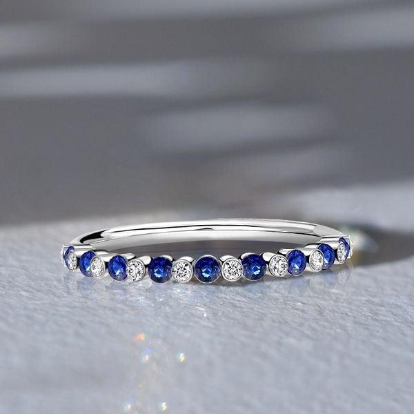 Sterling Silver Alternating White and Blue Sapphire Bezel Wedding Band (0.32 CT. TW.)