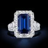 Emerald Cut Blue Sapphire Halo Ring in Sterling Silver