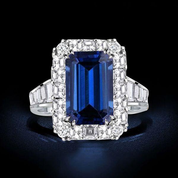 Emerald Cut Blue Sapphire Halo Ring in Sterling Silver