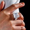 Three Stone Emerald Cut Created White Sapphire Engagement Ring in Rhodium Plated Sterling Silver