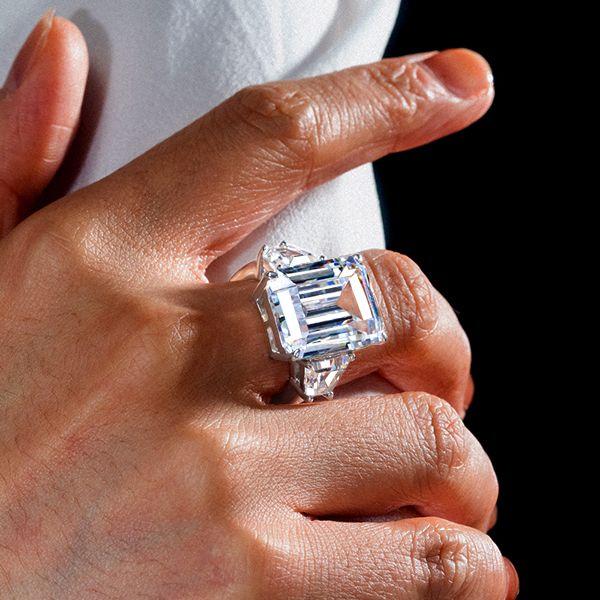 Three Stone Emerald Cut Created White Sapphire Engagement Ring in Rhodium Plated Sterling Silver