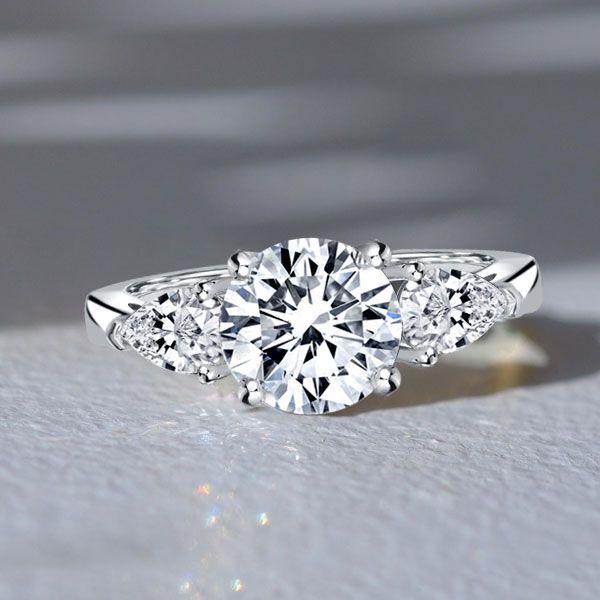 Sterling Silver Round & Pear Cut Three Stone Engagement Ring - 3.00 CT. TW.