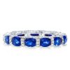 Oval Created Sapphire Wedding Band in 925 Sterling Silver with Rhodium Finish