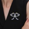 Vintage Blue & White Round Cut Bow Brooch Pin in 925 Sterling Silver Plated