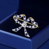 Vintage Blue & White Round Cut Bow Brooch Pin in 925 Sterling Silver Plated