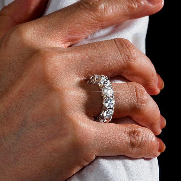 Eternity Round Created White Sapphire Wedding Band in Rhodium Plated Sterling Silver