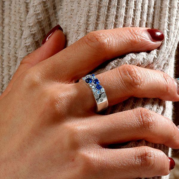 Blue Sapphire Round Cut Wedding Band in Sterling Silver with Rhodium Finish