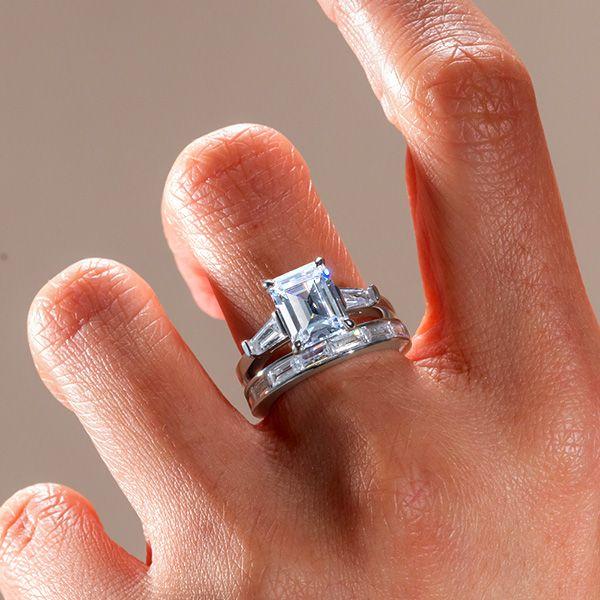 Emerald and Baguette Cut Three Stone Sterling Silver Bridal Set