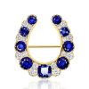 Golden Horseshoe Brooch with Blue Sapphire - Vintage Style