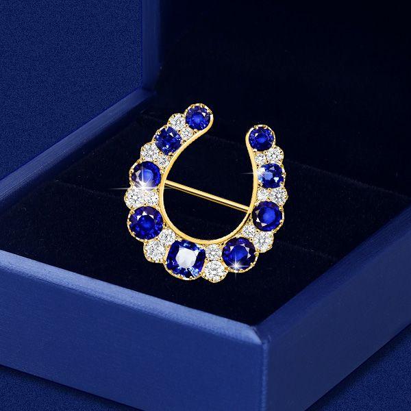 Golden Horseshoe Brooch with Blue Sapphire - Vintage Style