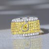 Micro-Pave Emerald and Pear Cut Yellow Topaz Eternity Band in Rhodium Plated Sterling Silver