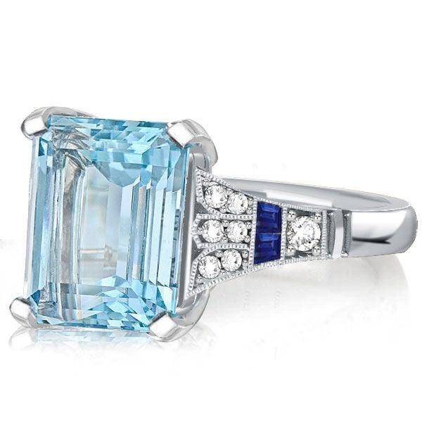 Art Deco Emerald Cut Aquamarine Engagement Ring in Rhodium Plated Sterling Silver