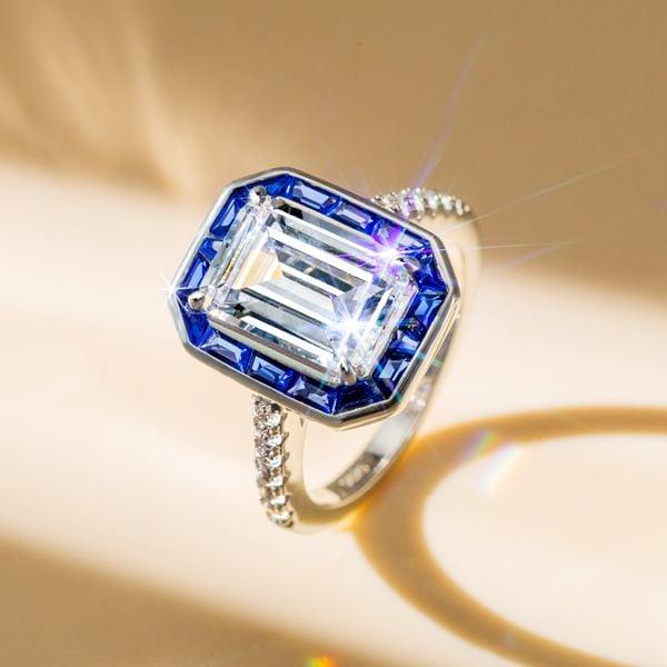Emerald Cut Bezel Engagement Ring in Rhodium-Plated Sterling Silver